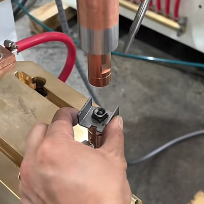 Spot welding of low carbon steel and M8 nuts